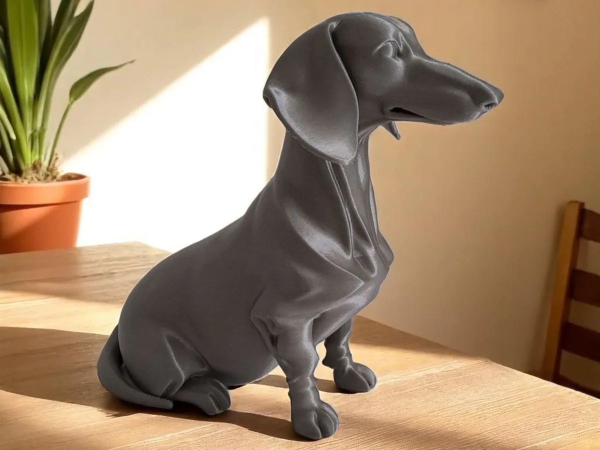 Figura minimalista de perro salchicha