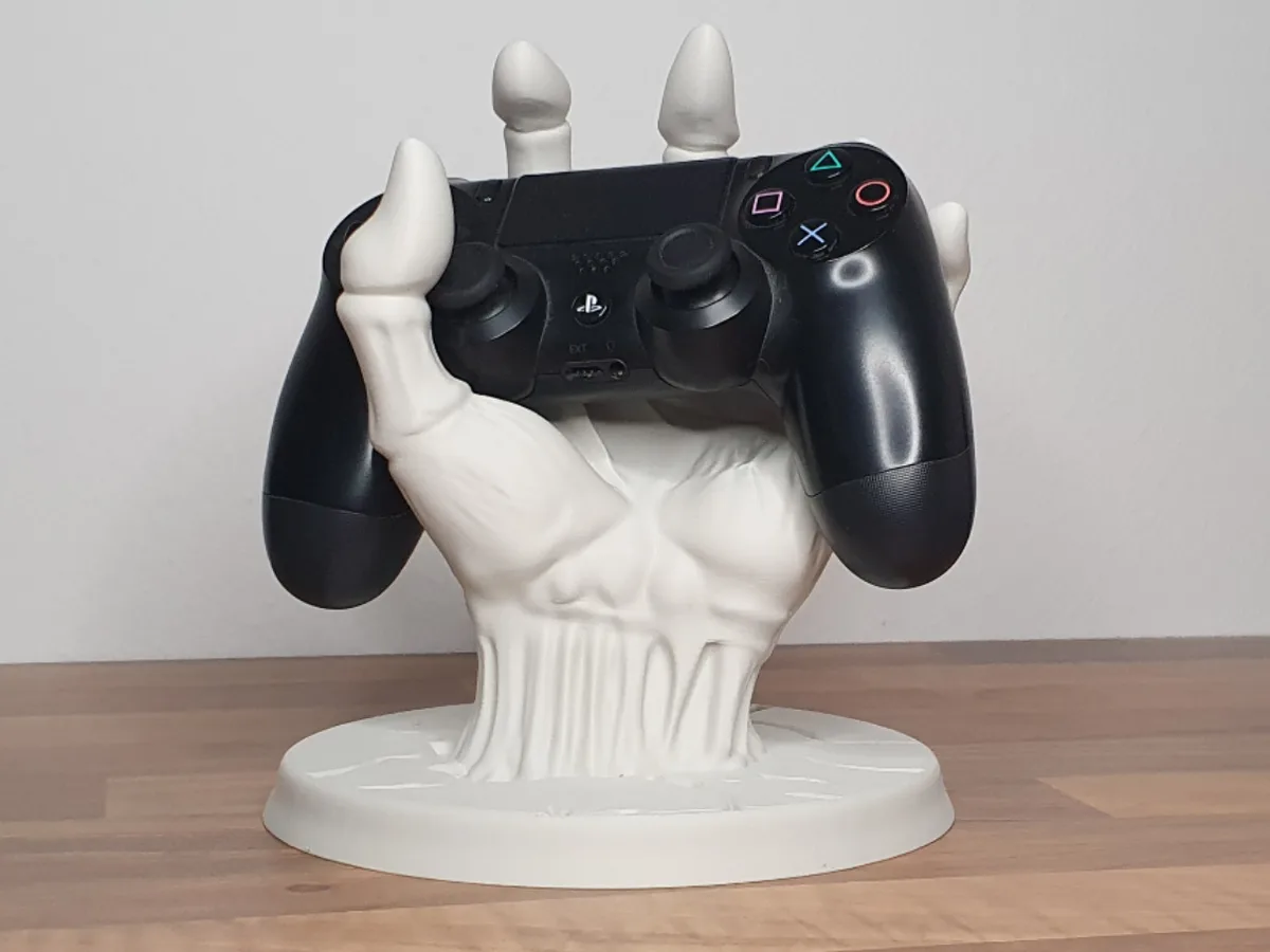 Soporte de joystick con forma de mano