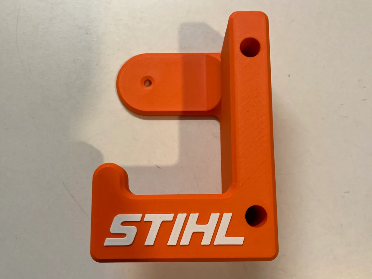 Colgador de pared para motosierra