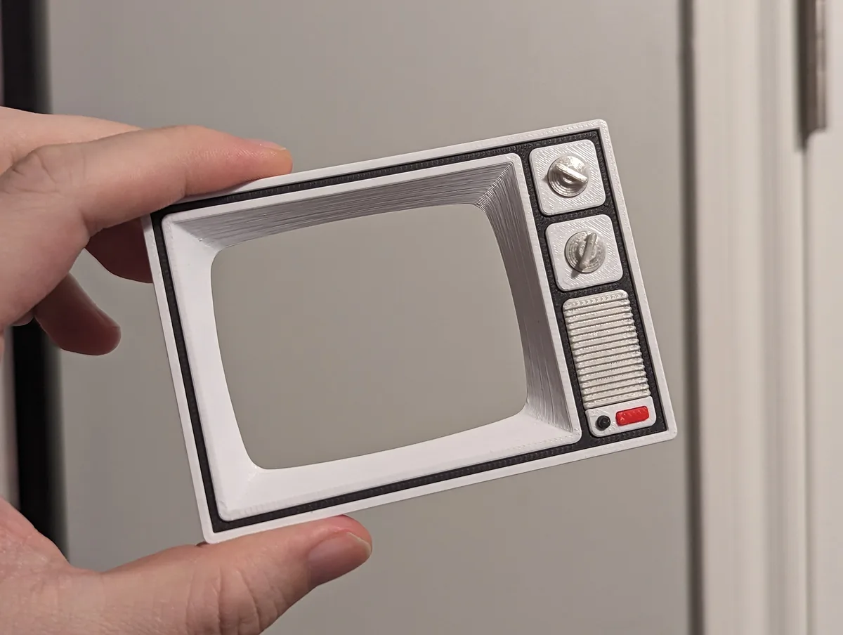 Portarretratos imantado de televisor antiguo