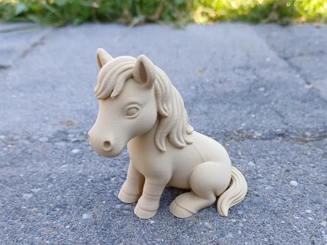 Caballo sentado de adorno