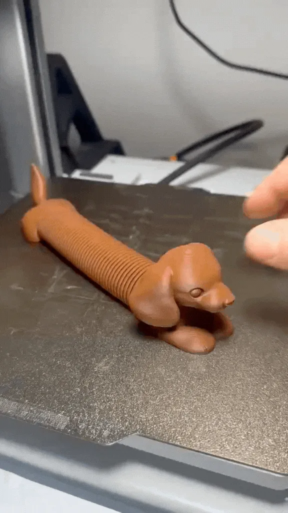 Perro salchicha articulado