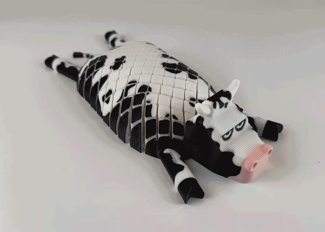 Vaca articulada de escritorio