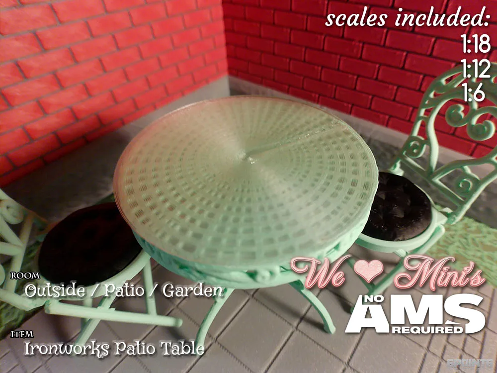 Mesa de patio de hierro forjado en miniatura