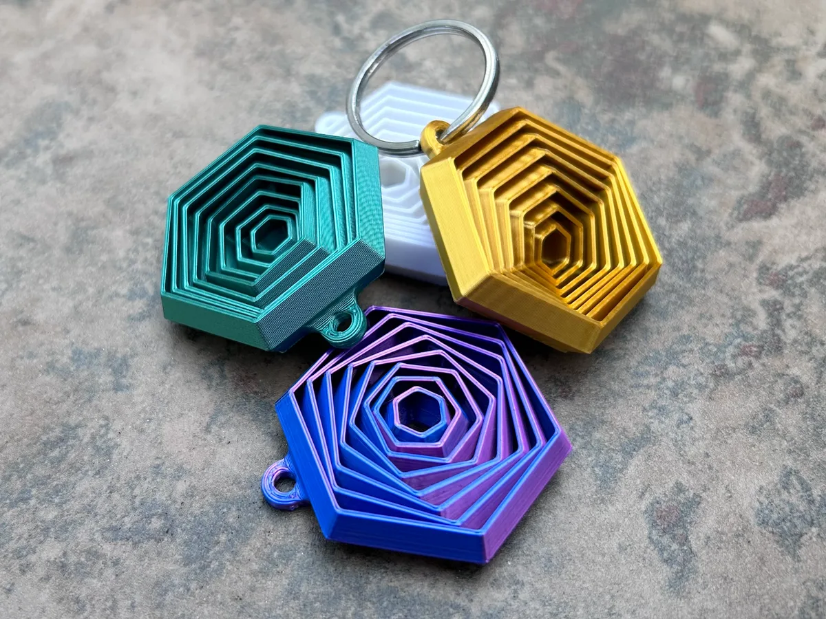 Llavero antiestrés hexagonal
