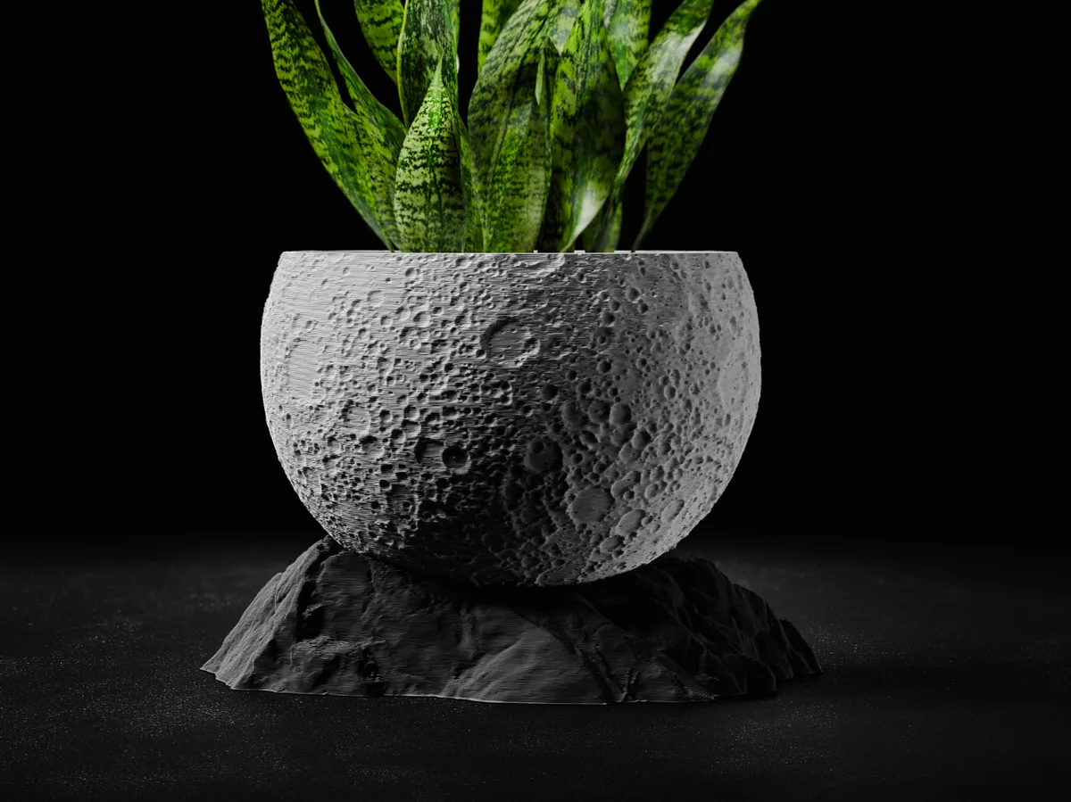 Maceta con forma de luna y su base
