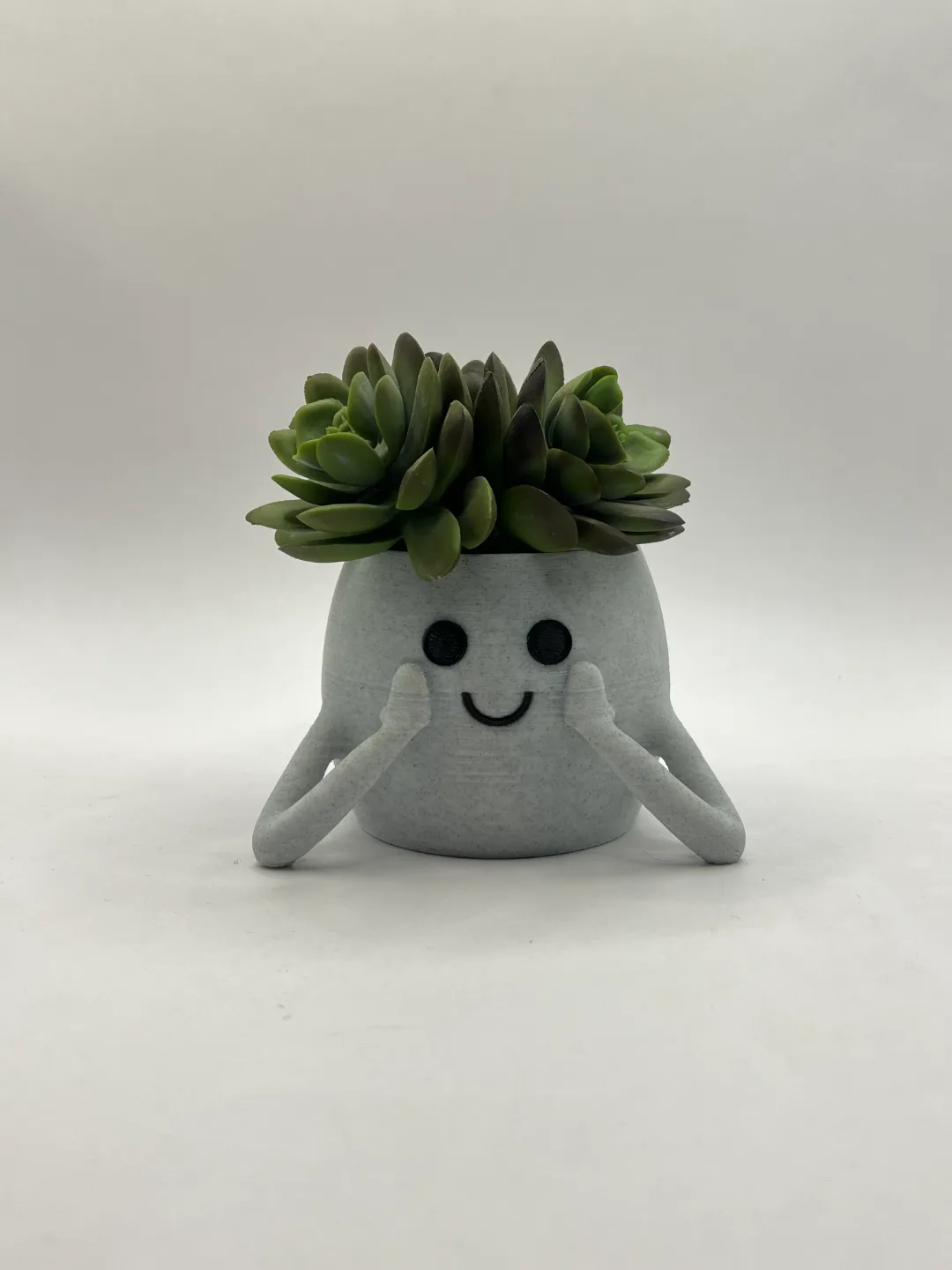 Maceta con figura recostada