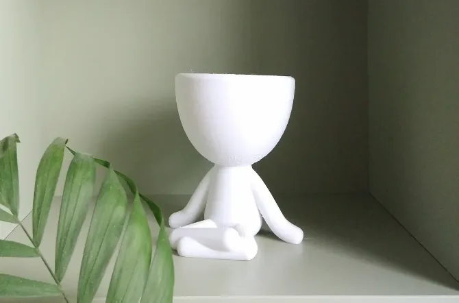 Maceta con cara meditando