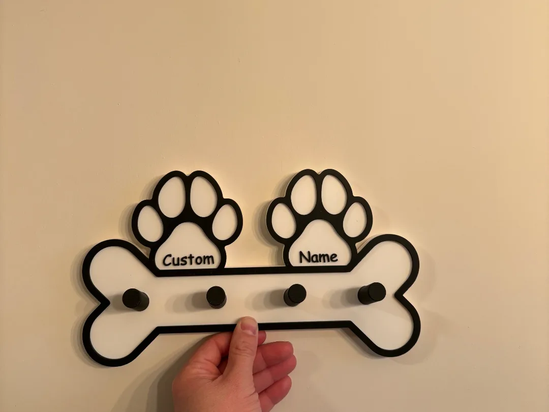 Colgador de correas con huellas