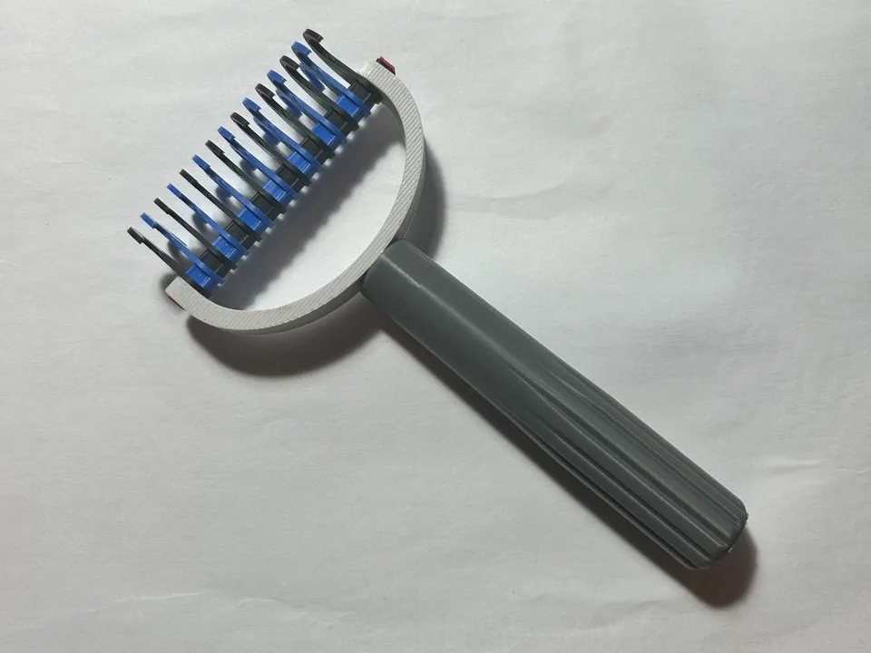 Peine para desenredar y sacar pelo suelto