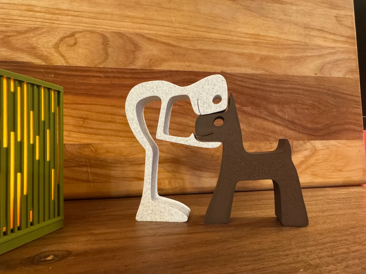 Adorno de persona con su mascota