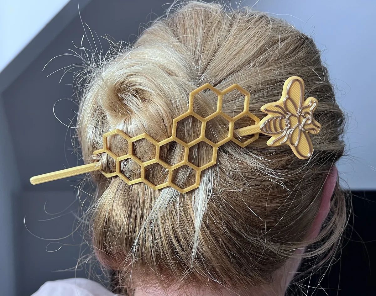 Hebilla de pelo con abeja y panal
