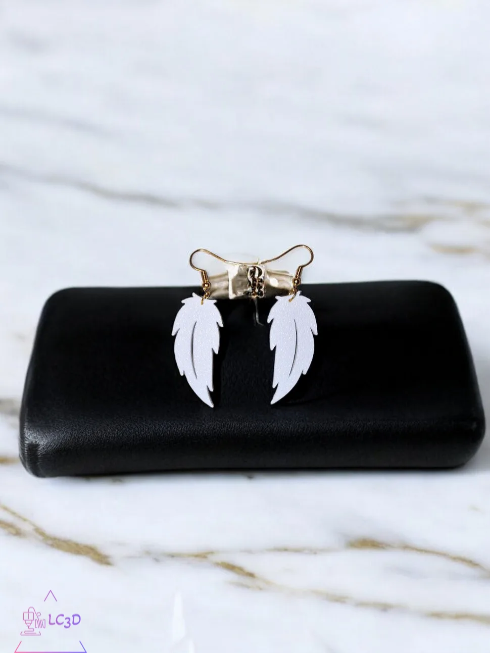 Aros de pluma