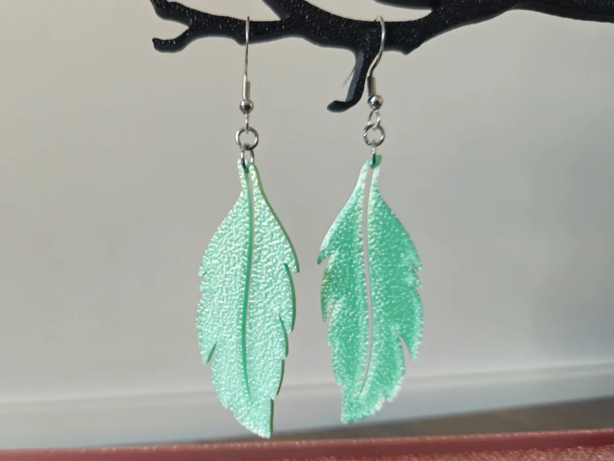 Aros de pluma calada
