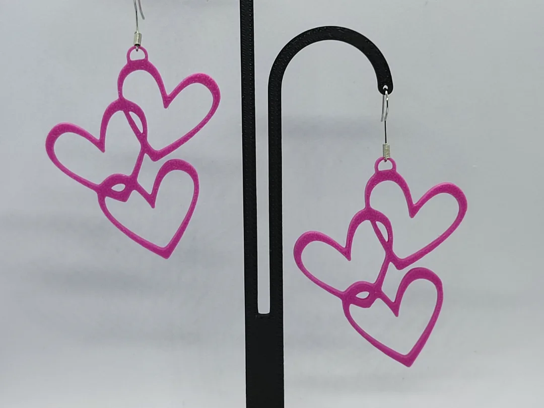 Aros de corazones entrelazados