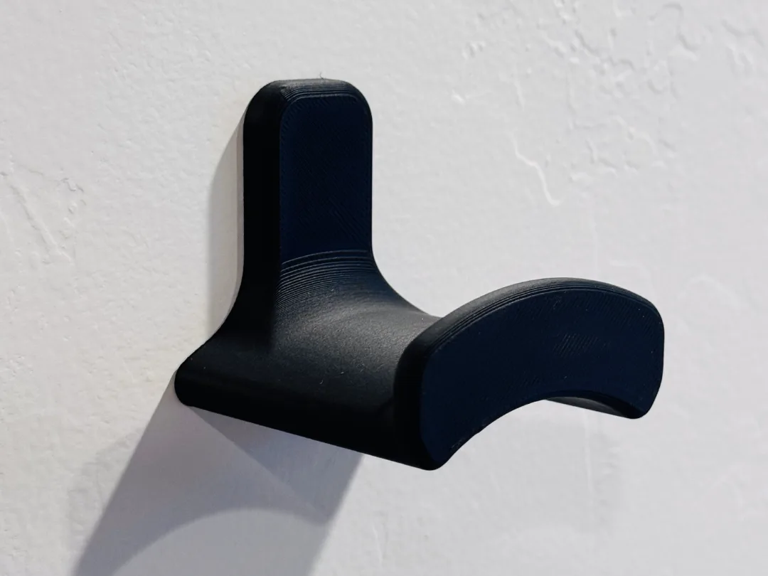 Colgador de auriculares para la pared