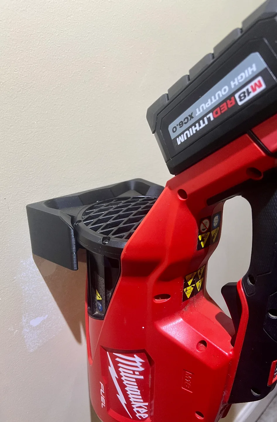 Soporte de pared para sopladora inalámbrica