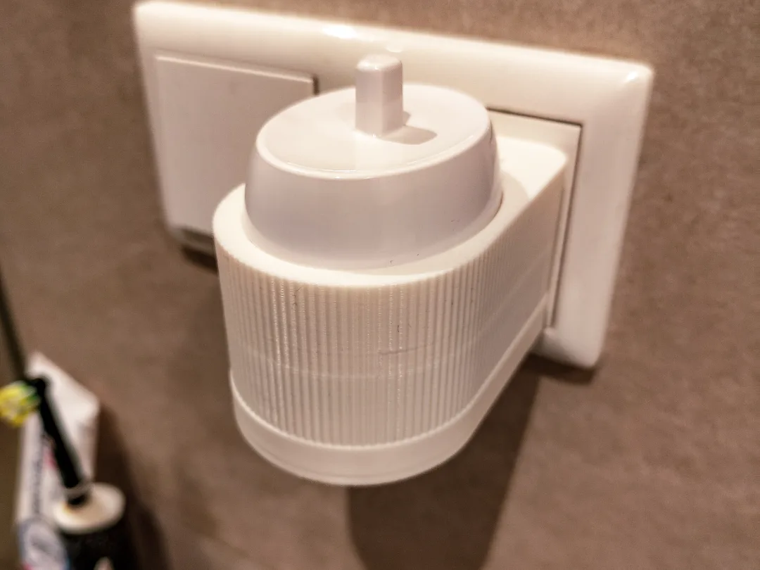 Soporte de pared para cepillo de dientes eléctrico