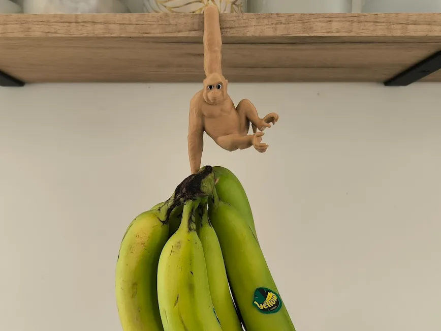Colgador de bananas con forma de mono