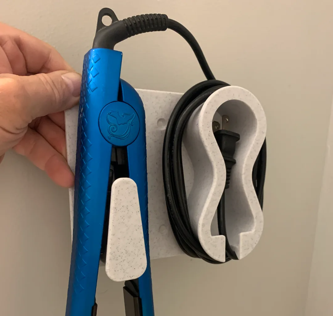 Soporte de pared para planchita de pelo