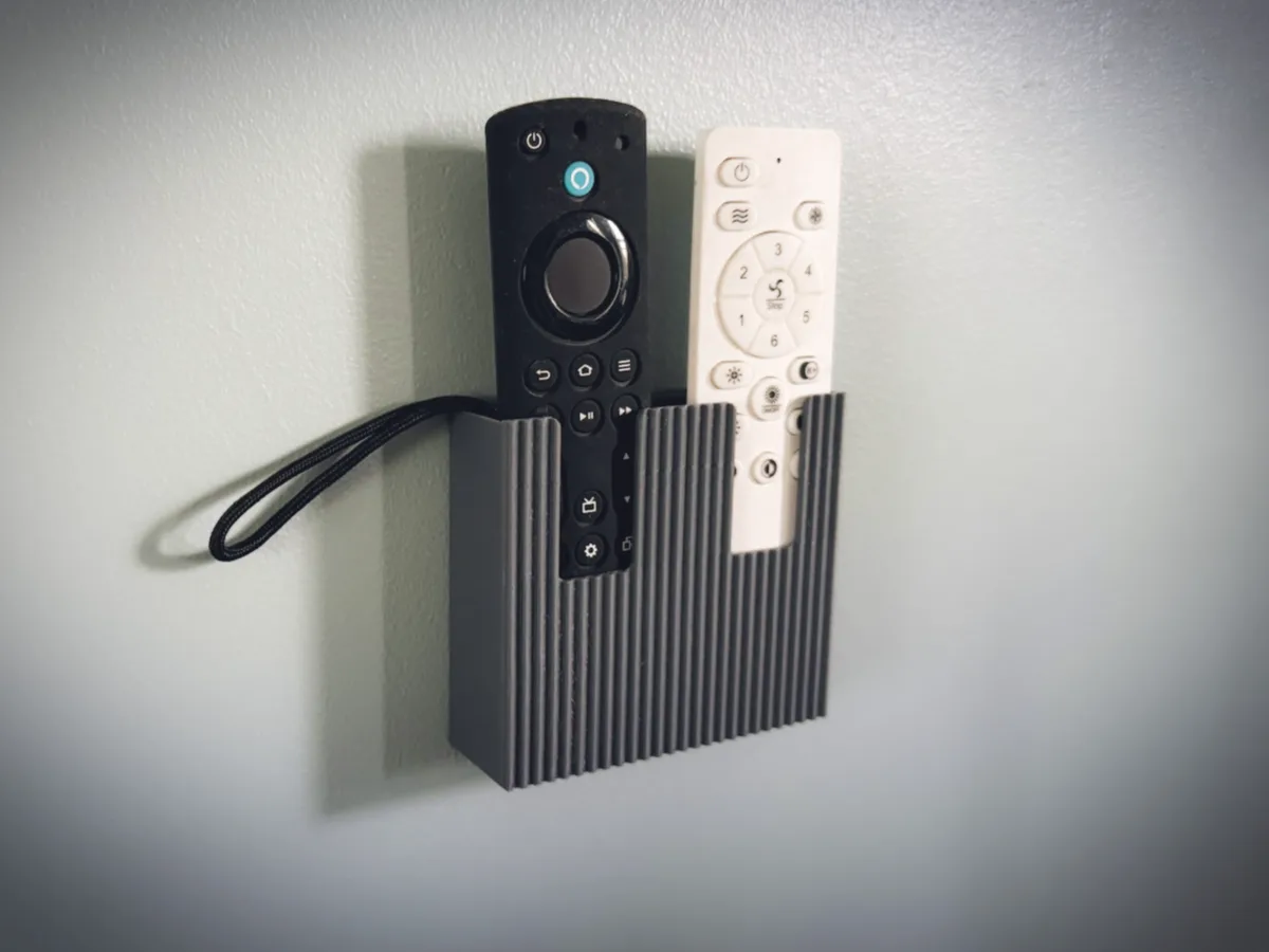 Soporte de pared para controles remotos