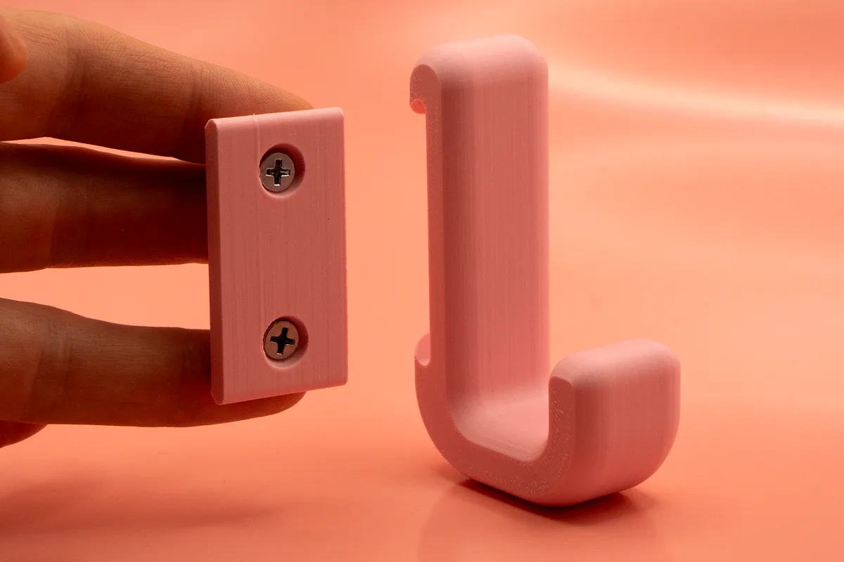 Gancho de pared con tornillos escondidos