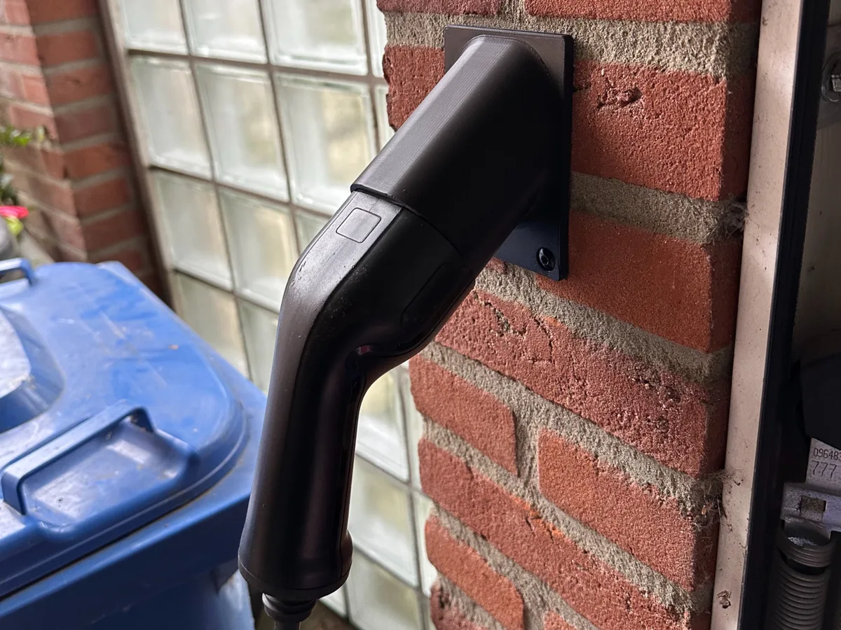 Soporte de pared para cable de carga de auto eléctrico
