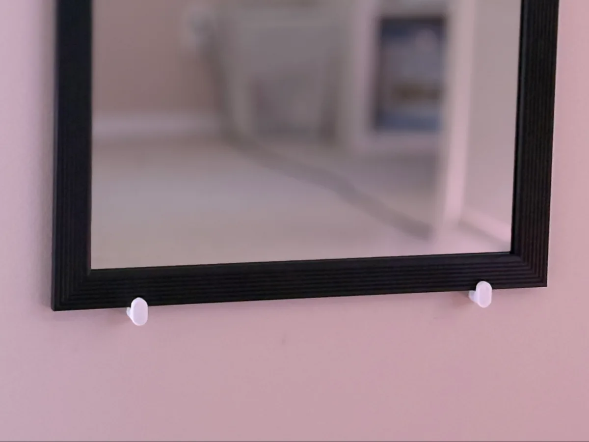 Soporte de pared para espejo