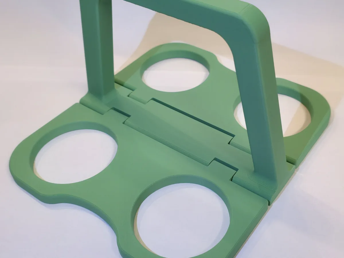 Portavasos plegable para cuatro vasos
