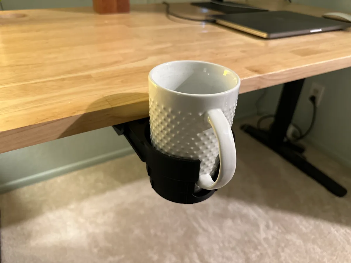 Portavaso retráctil para el escritorio