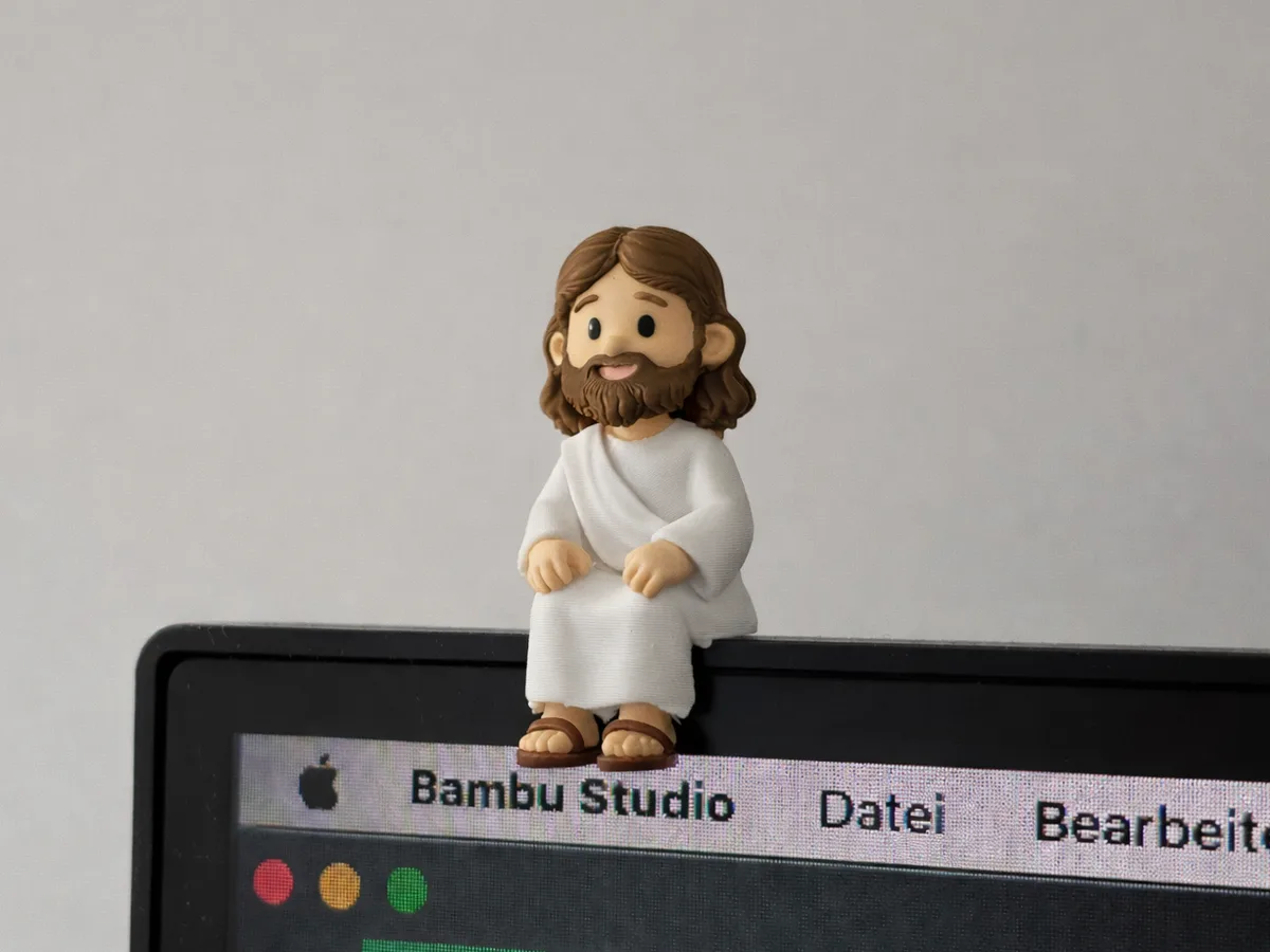 Figura devocional para el borde del monitor