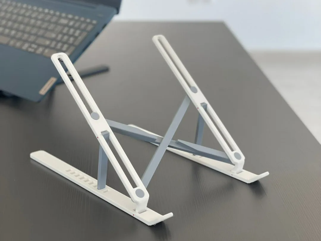 Soporte de notebook que sale armado de la impresora