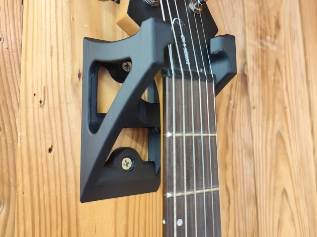 Colgador de pared para guitarra por el mástil