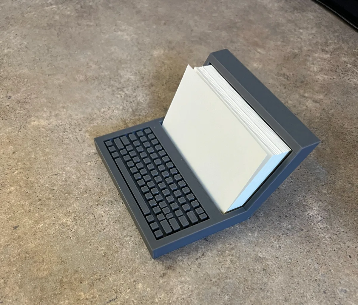 Tarjetero con forma de notebook
