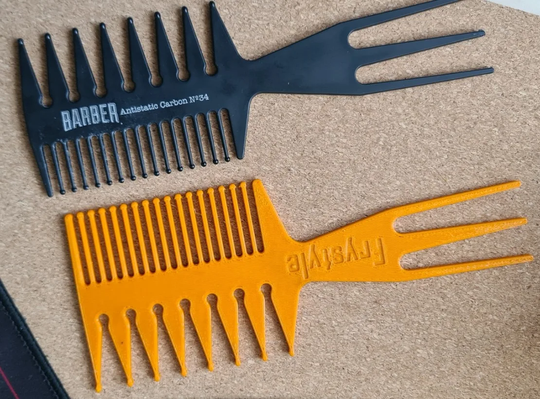 Peine de peluquería con forma de pez