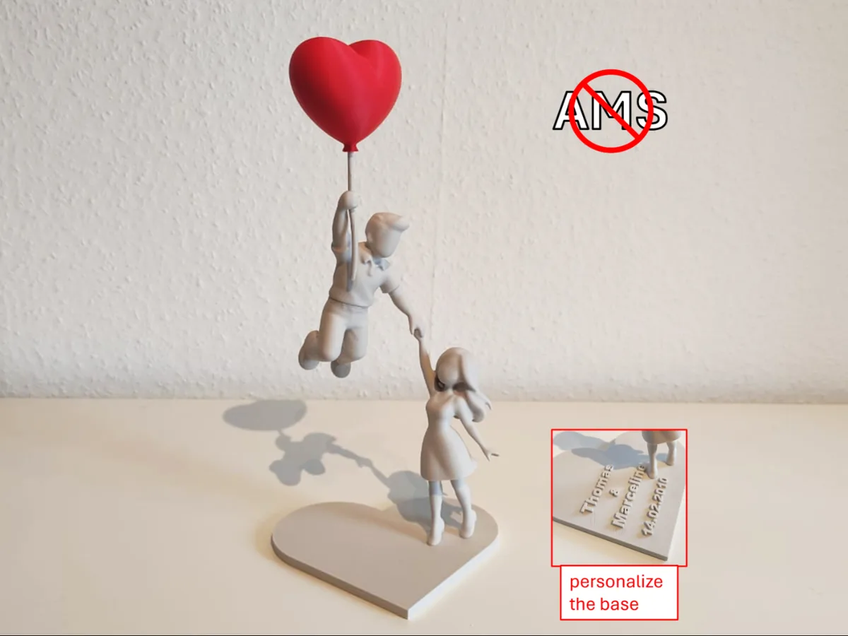 Escultura de dos figuras en equilibrio