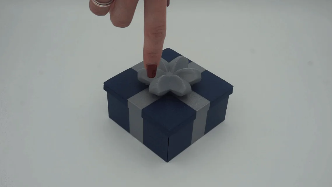 Caja de regalo que se cierra sola