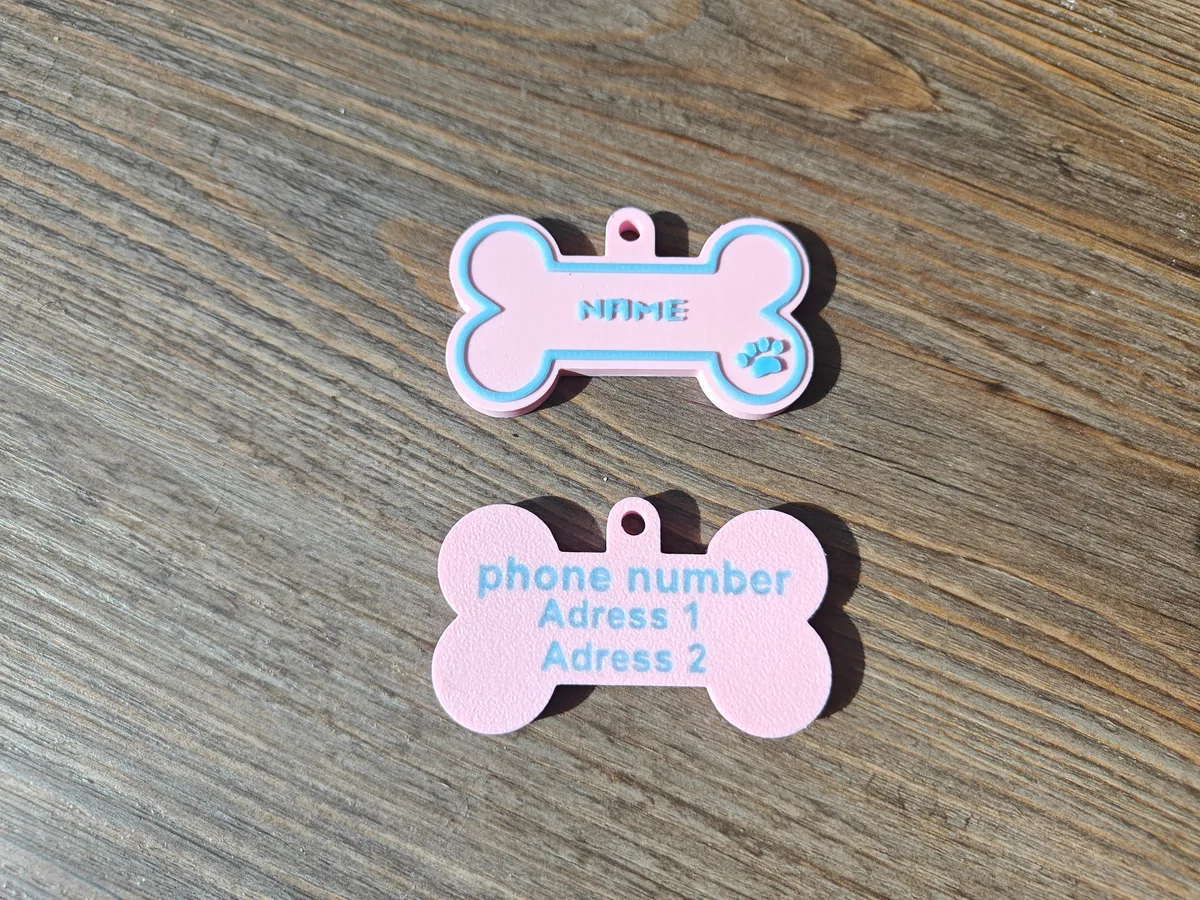 Chapita para perro con nombre y teléfono