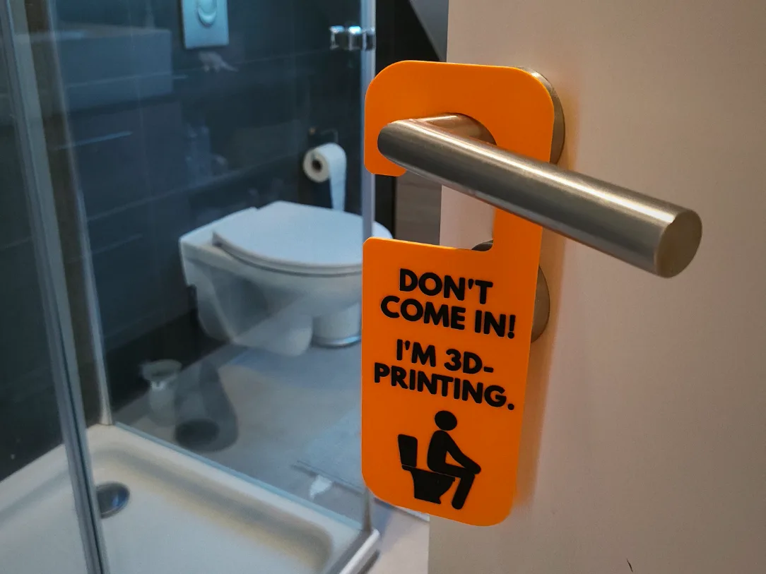 Cartel de baño con chiste