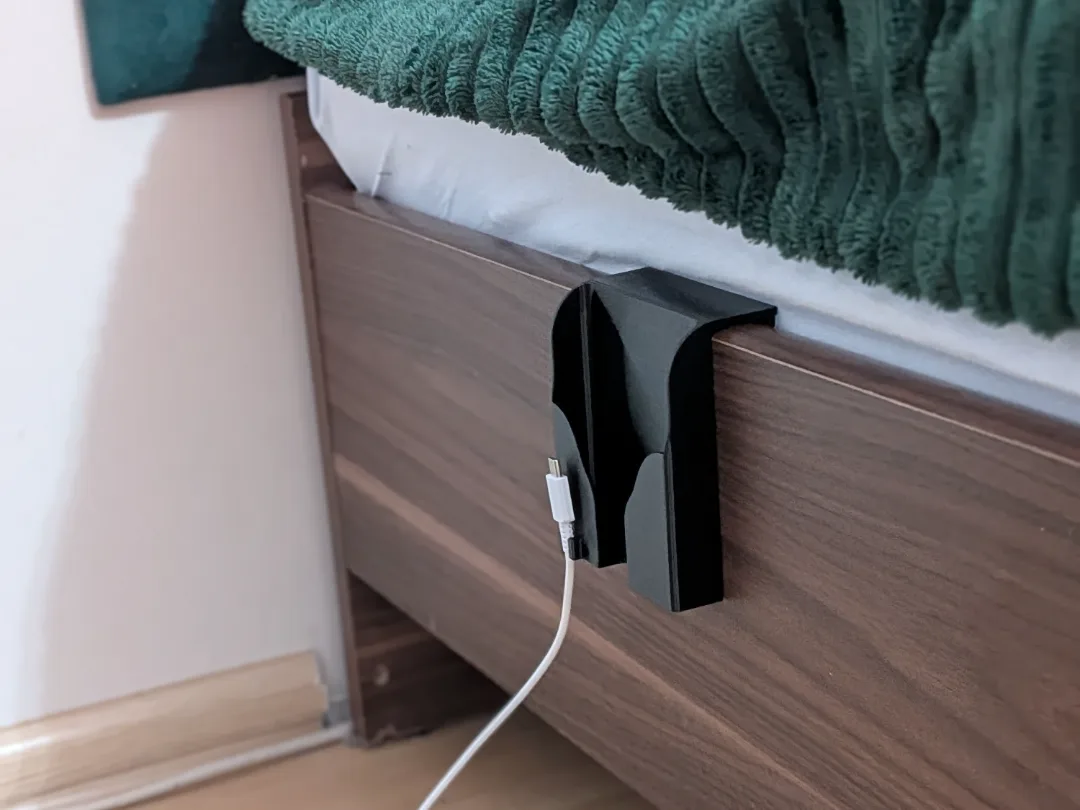 Soporte de celular para el respaldo de la cama